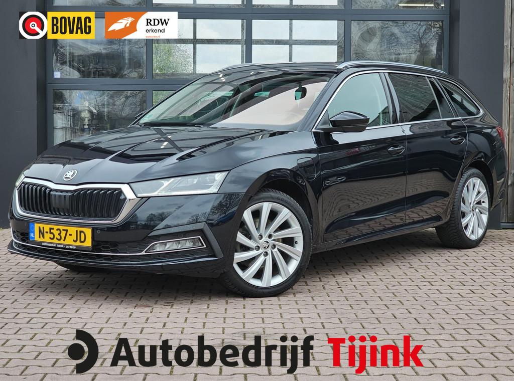 Skoda Octavia Combi 1.4 TSI iV PHEV Business Edition Plus |, Stof, Gebruikt, Euro 6, Met garantie (alle)