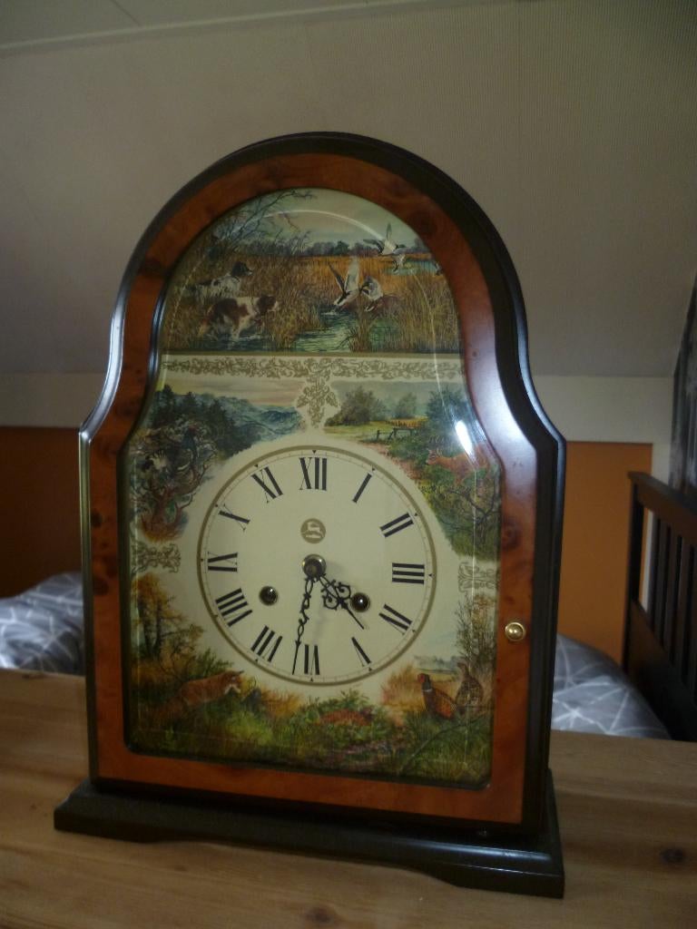 Klok met jacht-tafereel, Ophalen