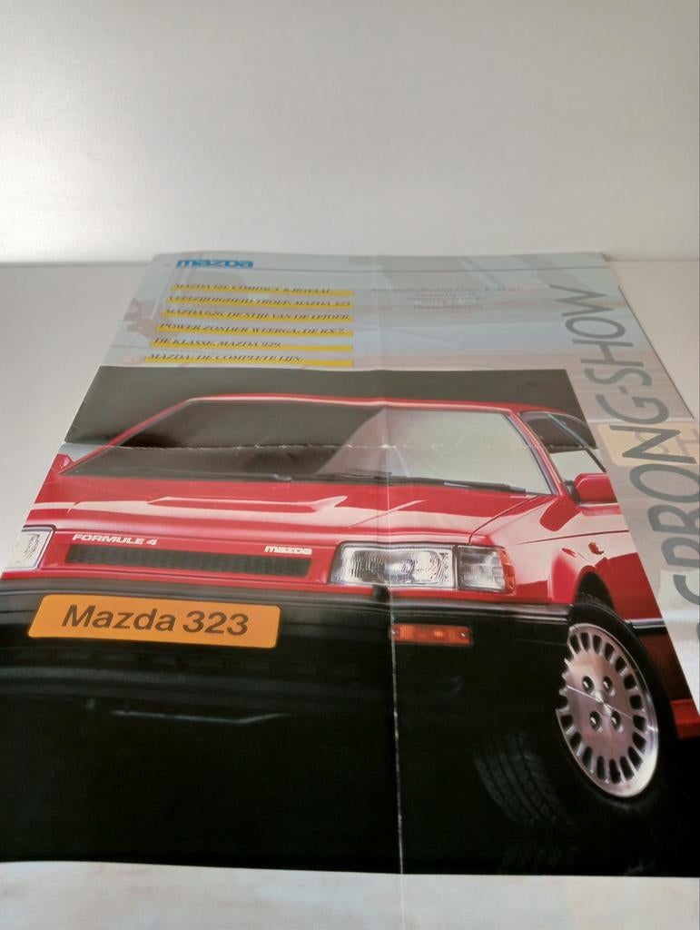 Mazda 323 Brochure - Zeldzaam exemplaar, Boeken, Mazda, Nieuw, Ophalen of Verzenden, Mazda Corporation