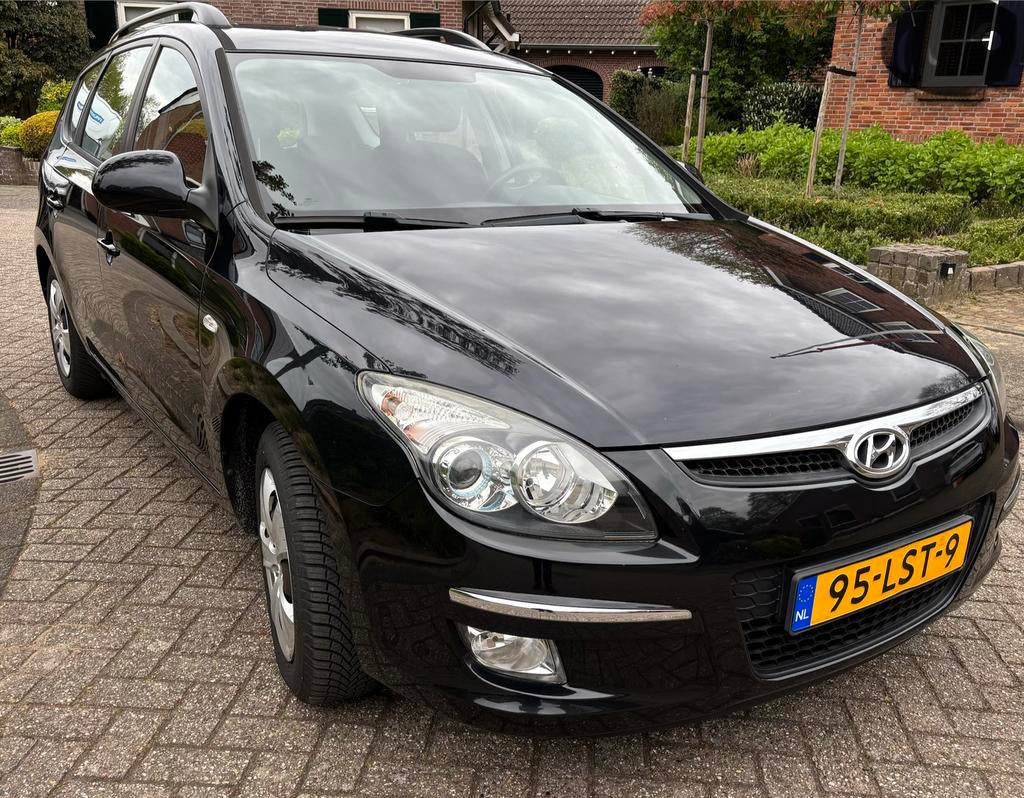 Hyundai i30 1.4i 2010 Zwart, Auto's, Hyundai, Particulier, i30, ABS, Airconditioning, Elektrische ramen, Isofix, Trekhaak, Benzine