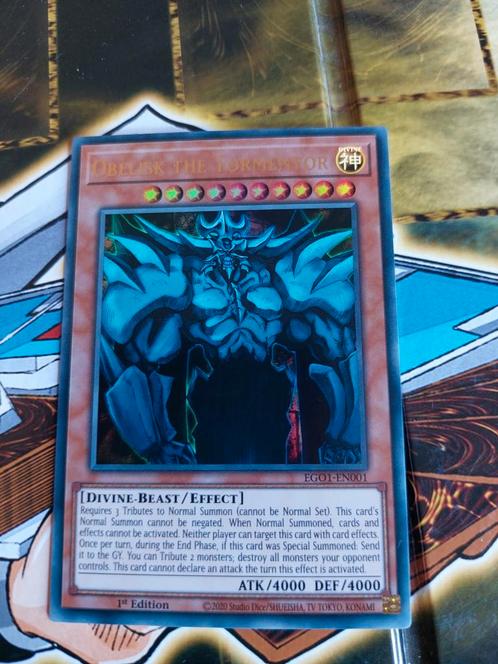 Obelisk the Tormentor ego1-en001 first edition, Hobby en Vrije tijd, Verzamelkaartspellen | Yu-gi-Oh!, Zo goed als nieuw, Ophalen of Verzenden