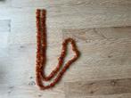 Amber ketting brokken lengte 105 cm, gewicht 60 gram., Ophalen of Verzenden, Zo goed als nieuw, Steen of Mineraal