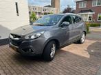 Hyundai iX35 1.6i GDI Blue 135pk 2012 Grijs, Voorwielaandrijving, 1280 kg, 4 cilinders, Leder en Stof