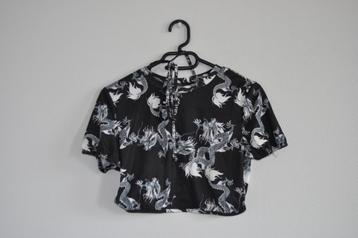 crop top met open rug beschikbaar voor biedingen