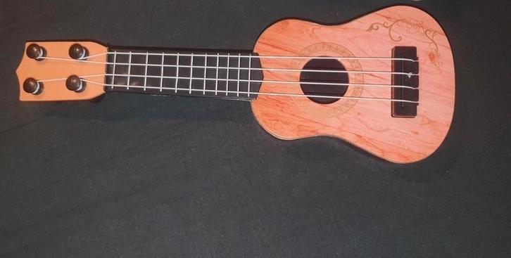 Leuke mini ukulele, perfect voor kinderen leuk sint cadeau., Kinderen en Baby's, Speelgoed | Overig, Nieuw, Ophalen of Verzenden