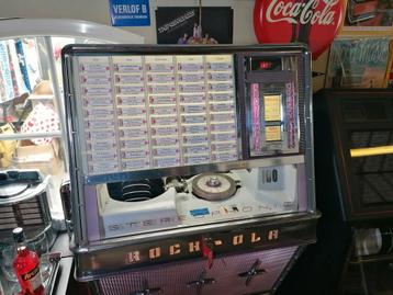 Te koop mooie gerestaureerde Rock-ola 1494 wandjukebox beschikbaar voor biedingen
