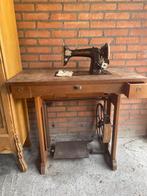 Antieke naaimachine, Ophalen