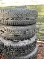 Stalen VW UP velgen met winterbanden en wieldoppen, Ophalen