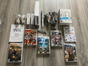 Nintendo Wii - 2 controllers - 2 nunchuks - 6 games beschikbaar voor biedingen