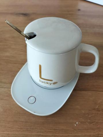 Kopje met warmhoudplaatje via USB beschikbaar voor biedingen