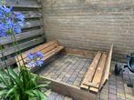 Houten zandbak met bankjes, Ophalen