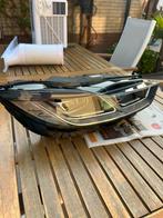 Jaguar koplamp, Ophalen