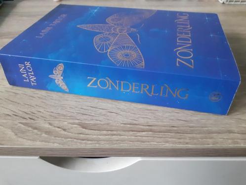 YA Fantasy boek Zonderling van Laini Taylor, Boeken, Fantasy, Zo goed als nieuw, Ophalen of Verzenden