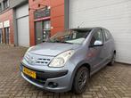Nissan Pixo 1.0 50KW 5D 2010 Grijs Apk 07-11-2026!, Auto's, Nissan, Voorwielaandrijving, Euro 5, Stof, Overige kleuren