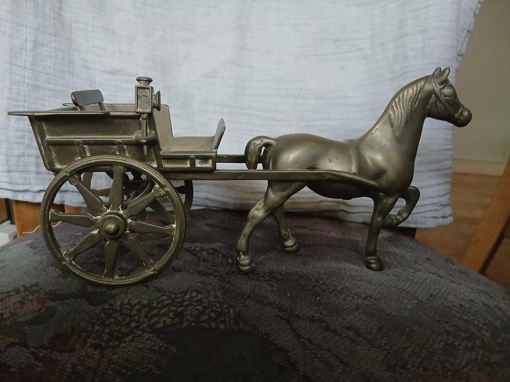 Koperen paard en wagen., Ophalen