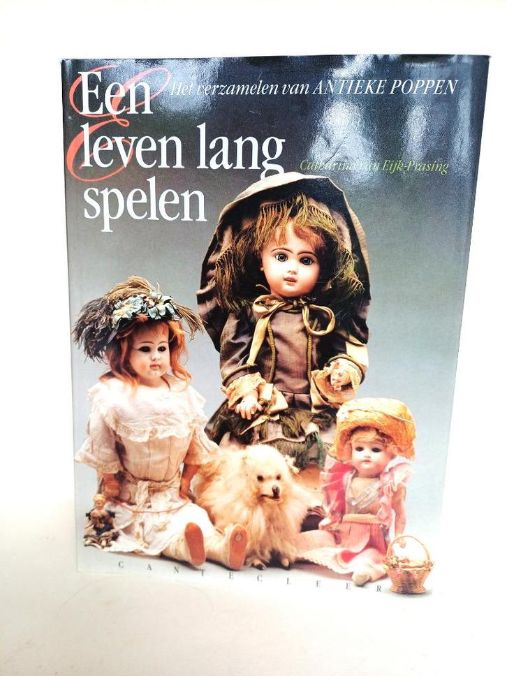 boek antieke poppen, "een leven lang spelen" 1e druk 1988, Verzamelen, Poppen, Zo goed als nieuw, Overige typen, Ophalen of Verzenden