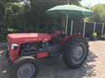 Tractor MF 35X met grondbak en pallet lichter., Ophalen of Verzenden, Transport