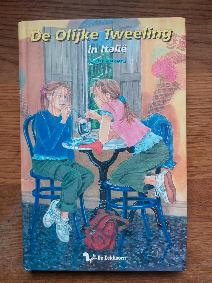 De Olijke Tweeling - Arja Peters, Boeken, Kinderboeken | Jeugd | onder 10 jaar, Zo goed als nieuw, Fictie algemeen, Ophalen of Verzenden