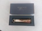 Gucci schoenlepel ,nieuw in orig verpakking,goudkleurig, Verzamelen, Merken en Reclamevoorwerpen, Ophalen of Verzenden, Nieuw