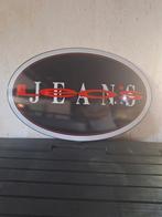 Zeldzaam Leo's Jeans emaille reclamebord uit 1993, Verzamelen, Merken en Reclamevoorwerpen, Ophalen of Verzenden, Gebruikt, Reclamebord