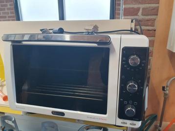 De'Longhi vrijstaande oven beschikbaar voor biedingen