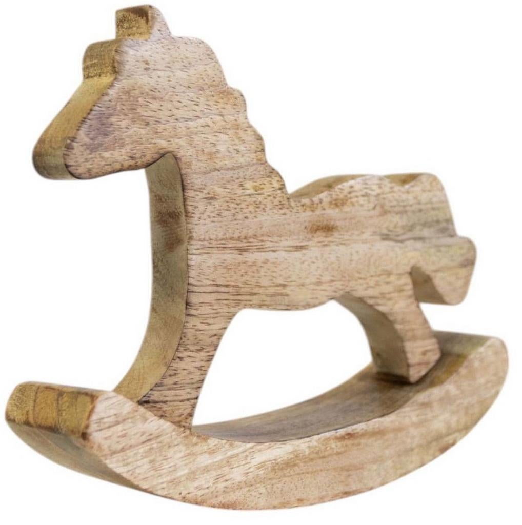 Houten Hobbelpaard Het Stuk Speelgoed Bevindt Zich Op De Achtergrond Van Een Decoratieve Open Haard En Lichtblauwe Muur Met Image147721819