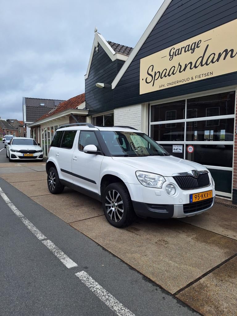 Skoda Yeti 1.2 TSI 77KW 2010 Wit, Auto's, Skoda, Bedrijf, Yeti, ABS, Airbags, Airconditioning, Bluetooth, Centrale vergrendeling
