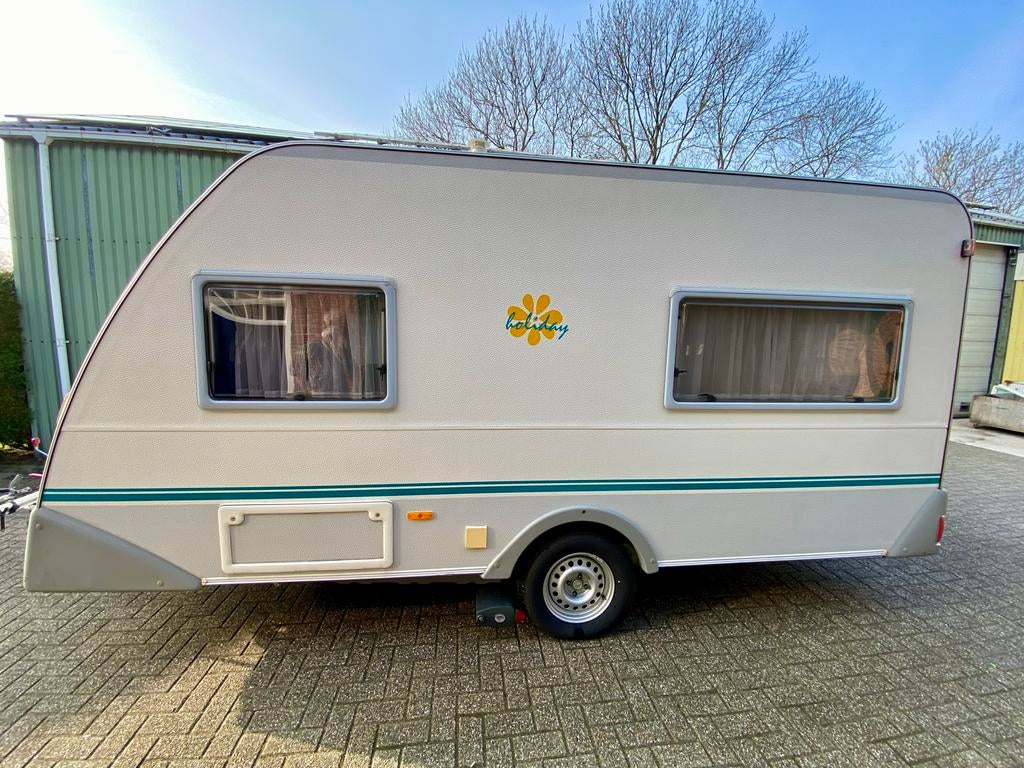 Eifelland Holiday caravan uit 1999, Caravans en Kamperen, Caravans, Vast bed, Rondzit, Luifel, Tot en met 4