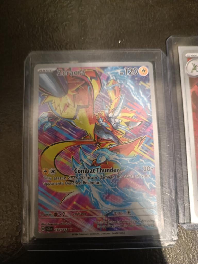 Pokémon kaarten: Scizor en Zeraora (Foil), Ophalen of Verzenden, Zo goed als nieuw, Meerdere kaarten, Foil