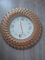 Gouden wandklok met pauwenveer design en strass, Ophalen