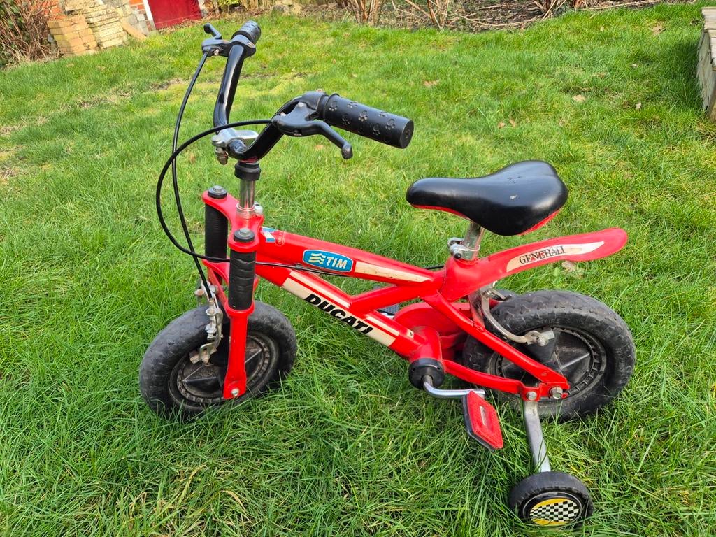 Ducati kinderfiets 12 inch met zijwieltjes, Fietsen en Brommers, Fietsen | Kinderfietsjes, Ophalen, Zijwieltjes, Gebruikt, Minder dan 16 inch