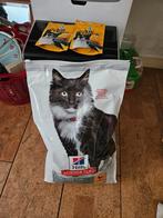 Grote zak Hill's kattenvoer, Ophalen