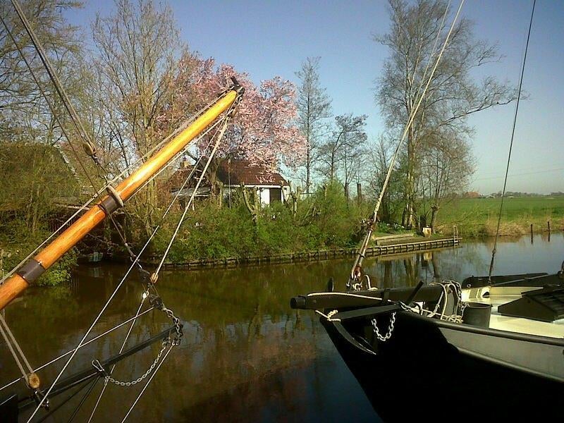Bij Sneek heel fijn vakantiehuisje direct aan vis/vaarwater., Internet, 2 slaapkamers, Landelijk, Friesland