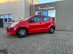 Nissan Pixo 1.0 50KW 5D 2010 Rood, Auto's, Nissan, Voorwielaandrijving, Euro 5, Stof, 4 stoelen
