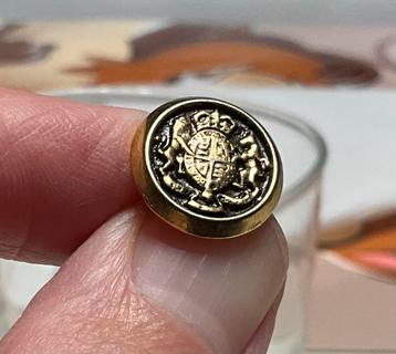 knoop het Britse Koninklijke Wapen (Royal Coat of Arms). beschikbaar voor biedingen