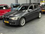 BMW 1-serie 116i Business Automaat Nieuwe APK NAP Xenon Navi, Auto's, BMW, Gebruikt, Zwart, 4 cilinders, Origineel Nederlands