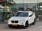 BMW X1 sDrive20i High Executive Automaat 2014 Leder stof Nav, Euro 6, 4 cilinders, Leder en Stof, Wit
