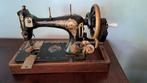 Antieke naaimachine, Ophalen