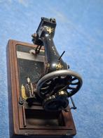 Antieke  Naaimachines, Ophalen