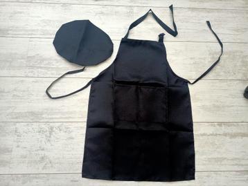 zwarte kinderschort met koksmuts - nieuw beschikbaar voor biedingen