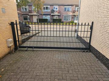 Tuinpoort draaipoort 393cm x 146cm zwaar staal zwart/grijs beschikbaar voor biedingen
