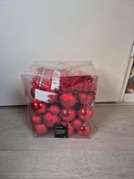 Rode kerstboomversiering, Ophalen