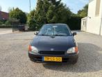 Toyota Starlet 1.3 16V 1998 Zwart, Auto's, 74 pk, 4 cilinders, Starlet, 400 kg