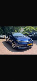 Toyota Auris 1.8 Hybrid Touring Sports CVT 2015 Blauw, 65 €/maand, 136 pk, Zwart, Blauw