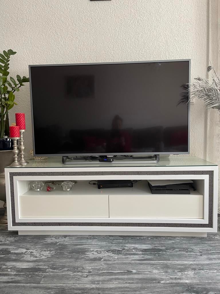 Tv meubel met glazen plaat, Ophalen, 150 tot 200 cm, Minder dan 100 cm, 25 tot 50 cm