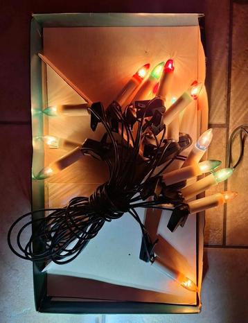 Kerstsnoer met gekleurde lampjes beschikbaar voor biedingen