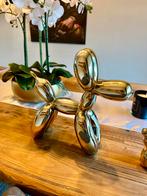 Jeff Koons style balloon dogs in geel gouden kleur., Ophalen