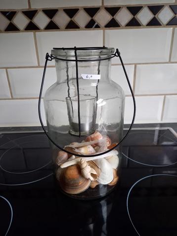 Groot glazen windlicht beschikbaar voor biedingen