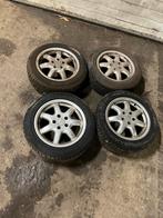 Audi. Velgen met nieuwewinterbanden, Ophalen