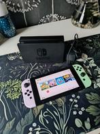 Nintendo switch met pastel controllers + lader + dock + 50gb, Spelcomputers en Games, Gebruikt, Verzenden, Met 2 controllers, Switch Original